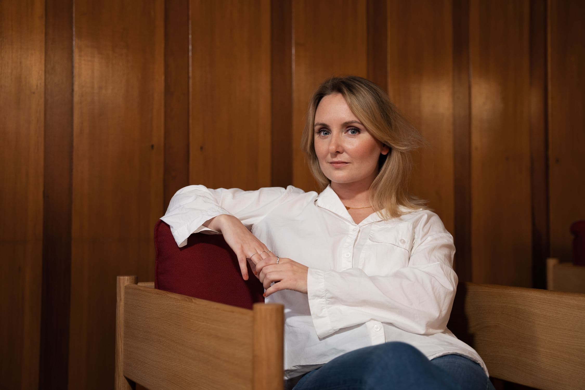 Employee in a wooden footstool